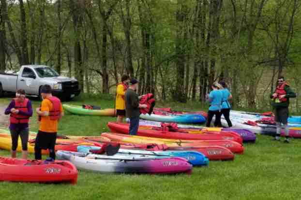 Canoes Going in the water in the Maumee Tri Adventure Race