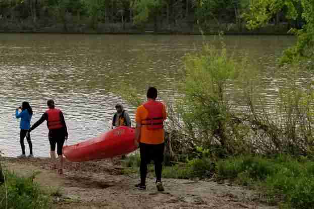 A MVTAR contestant preparing to come ashore and start hiking